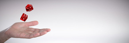 Hand gesturing against white background against grey backgroundの写真素材