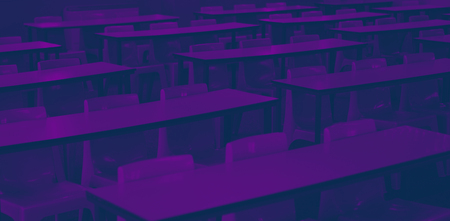 Chair and table in a classroom of a schoolの写真素材