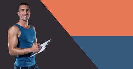 Digital composite of Fitness trainer man with minimal shapes writing on chartの写真素材