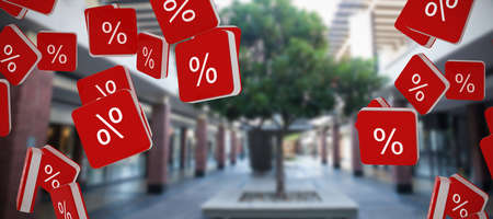 Defocused image of tree amidst walkway against percent sign vector iconの写真素材