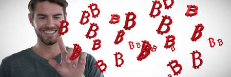 Man pretending to touch an invisible screen against several red bitcoin sign