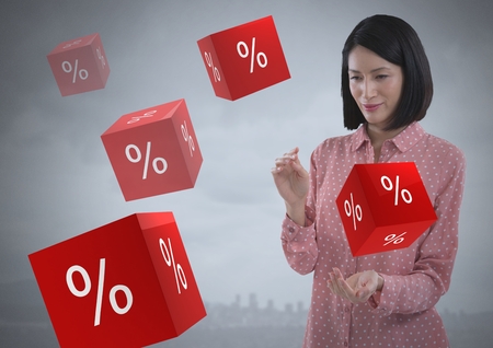 Digital composite of Percent icons and Businesswoman with hands palm open and dark backgroundの写真素材