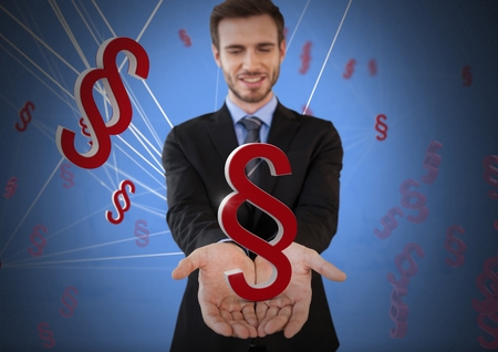 Digital composite of Section symbols icons and Businessman with hands palm open and dark backgroundの写真素材