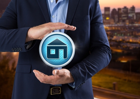 Digital composite of Home icon and Businessman with hands palm open in city at evening