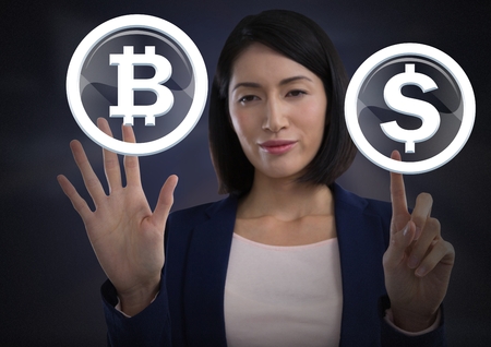 Digital composite of Businesswoman touching bitcoin graphic icon and dollar iconの写真素材