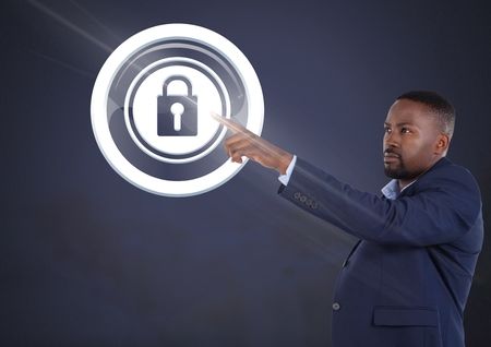 Digital composite of Businessman pointing security lock iconの写真素材