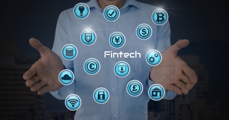 Digital composite of Businessman with hands palm open and Fintech with various business iconsの写真素材