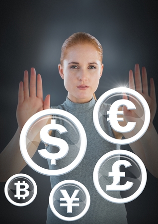 Digital composite of Futuristic Businesswoman interacting with international money currenciesの写真素材