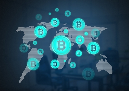 Digital composite of bitcoin graphic icons on world mapの写真素材