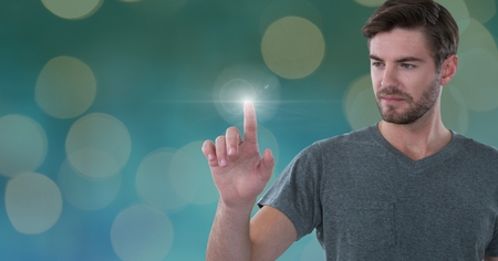 Digital composite of Businessman touching air light glowの写真素材