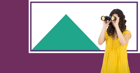 Digital composite of Woman with binoculars and minimal shapesの写真素材