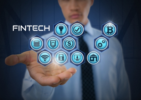 Digital composite of Businessman with hands palm open and Fintech with various business iconsの写真素材