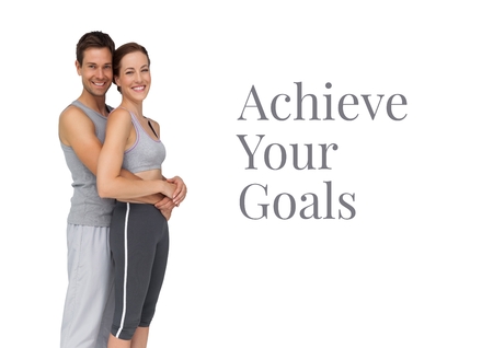 Digital composite of Achieve you goals text and fitness coupleの写真素材
