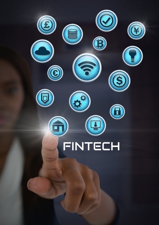 Digital composite of Businesswoman touching Fintech with various business iconsの写真素材