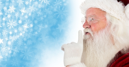 Digital composite of Santa hushing quiet and Snowflake Christmas pattern and blank spaceの写真素材