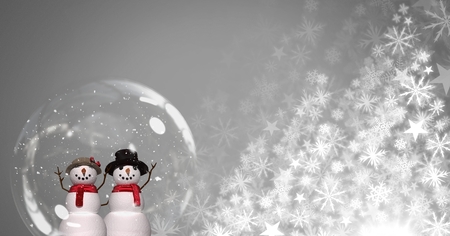 Digital composite of Snowmen in snow globe and Snowflake Christmas patternの写真素材