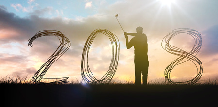 Golfer hit the golf ball  against cloudy sky