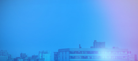 Buildings in city against sky during sunsetの写真素材