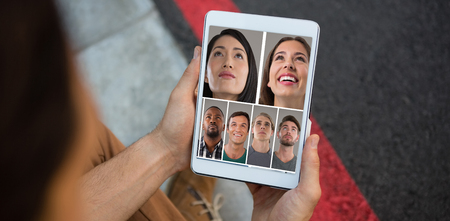 People collage portrait 7 wide against cropped hands of man holding tabletの写真素材
