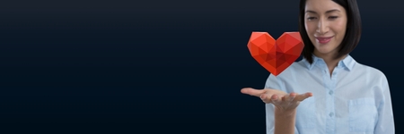 Digital composite of Woman with open hand and heartの写真素材