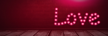 Digital composite of Love text glowing neon light bulbs over wooden floorの写真素材