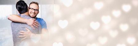 Digital composite of Gay Couple with valentine's love transition heartsの写真素材