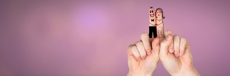Digital composite of Valentine's fingers love couple and pink backgroundの写真素材