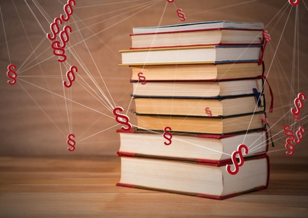 Digital composite of 3D Section symbol icons and books stacked up