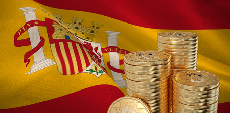 Bitcoin against digitally generated spanish national flagの写真素材