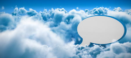 Speech bubble symbol against clouds against blue skyの写真素材