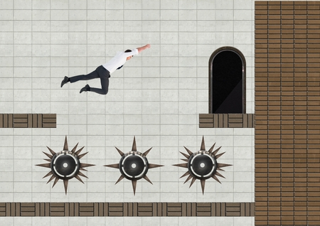 Digital composite of Businessman in Computer Game Level with trapsの写真素材