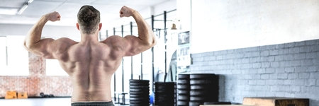 Digital composite of Fit strong Man in gym