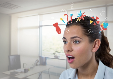 Digital composite of Surprised woman in an office with drawingsの写真素材