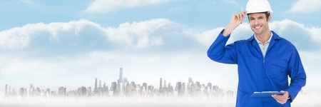 Digital composite of Construction Worker engineer over large city buildings
