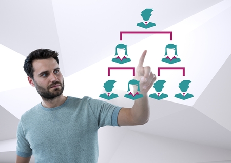 Digital composite of Hand pointing with business people icons connected treeの写真素材