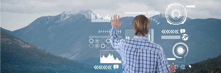 Digital composite of a business person touching nature screen interfaceの写真素材