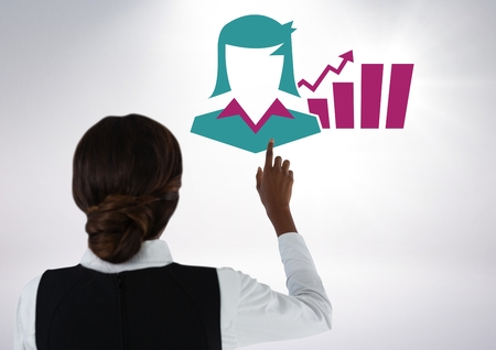 Digital composite of Hand pointing with businesswoman chart statistics iconの写真素材