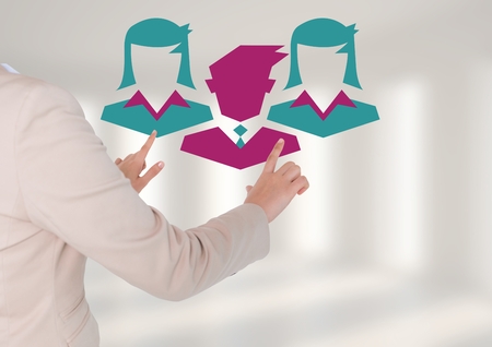 Digital composite of Hands pointing with business people iconsの写真素材