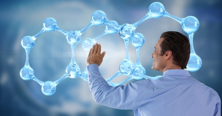 Digital composite of Man touching light interfaceの写真素材