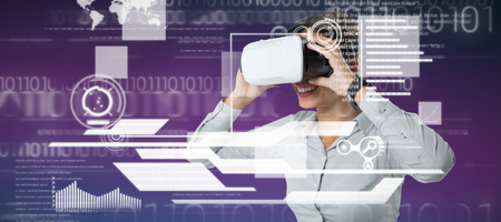 Female executive using virtual reality headset against purple and pink background