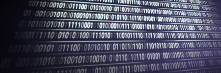 Binary code on digital screenの写真素材