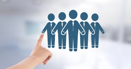 Digital composite of Hand touching business people group iconの写真素材