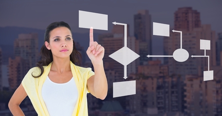 Digital composite of Hand touching wireframe with dark backgroundの写真素材