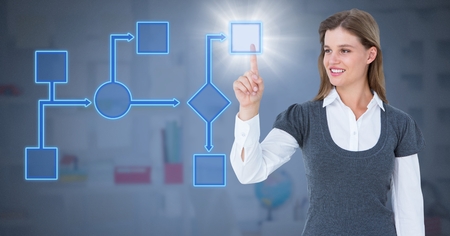 Digital composite of Woman's  hand touching blue wireframeの写真素材