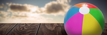 Colorful ball against view of beautiful sea