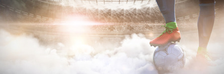 Soccer  against graphic image of stadium at duskの写真素材