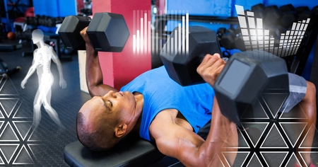 Digital composite of athletic fit man in gym with health interface