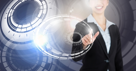 Digital composite of woman touching circle interfaceの写真素材