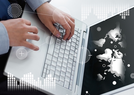 Digital composite of Business Overlay Interface with hands and laptop showing world mapの写真素材