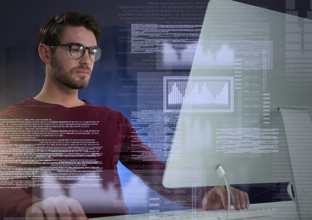 Digital composite of Businessman working on laptop with screen text interface